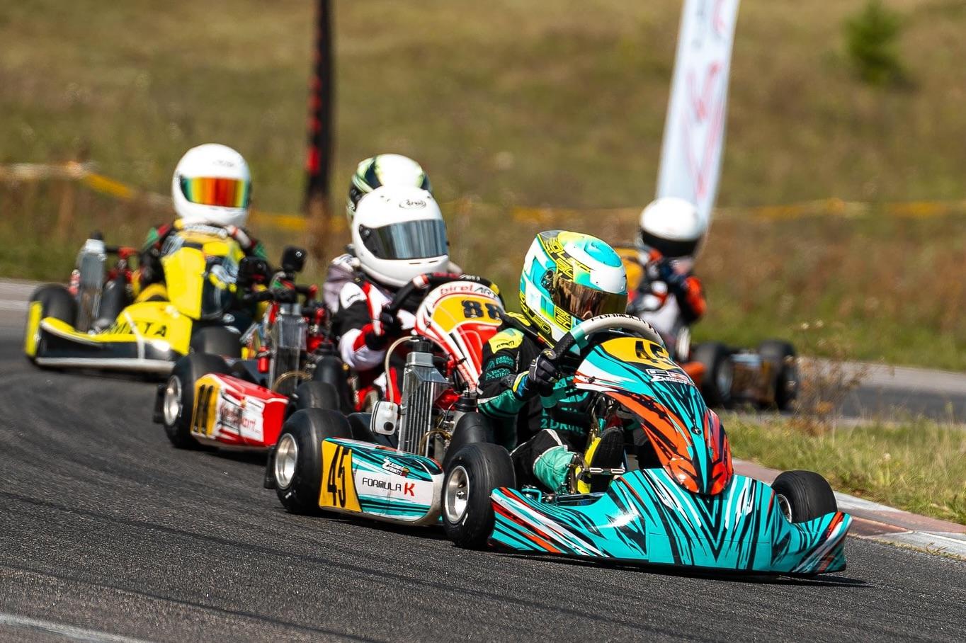 Dream 2 Drive Formula K kart leading a race